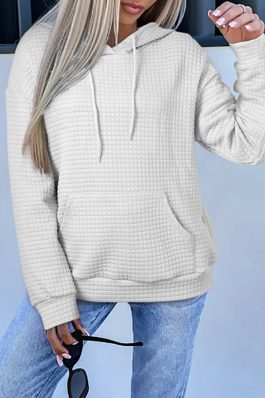 Expertly crafted with a textured white lattice design, this hoodie features a drawstring and kangaroo pocket for both style and convenience.