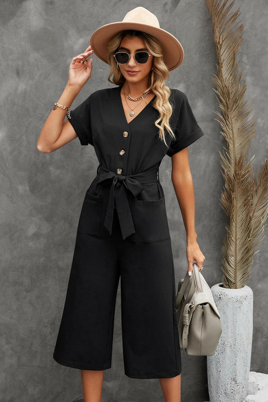 This jumpsuit features a V neck, convenient pockets, and a belt for a casual yet sophisticated look, suitable for formal and business casual occasions.